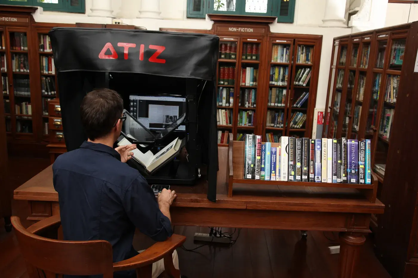 BookDrive scanner being used in a library